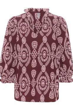 CUtia Blus